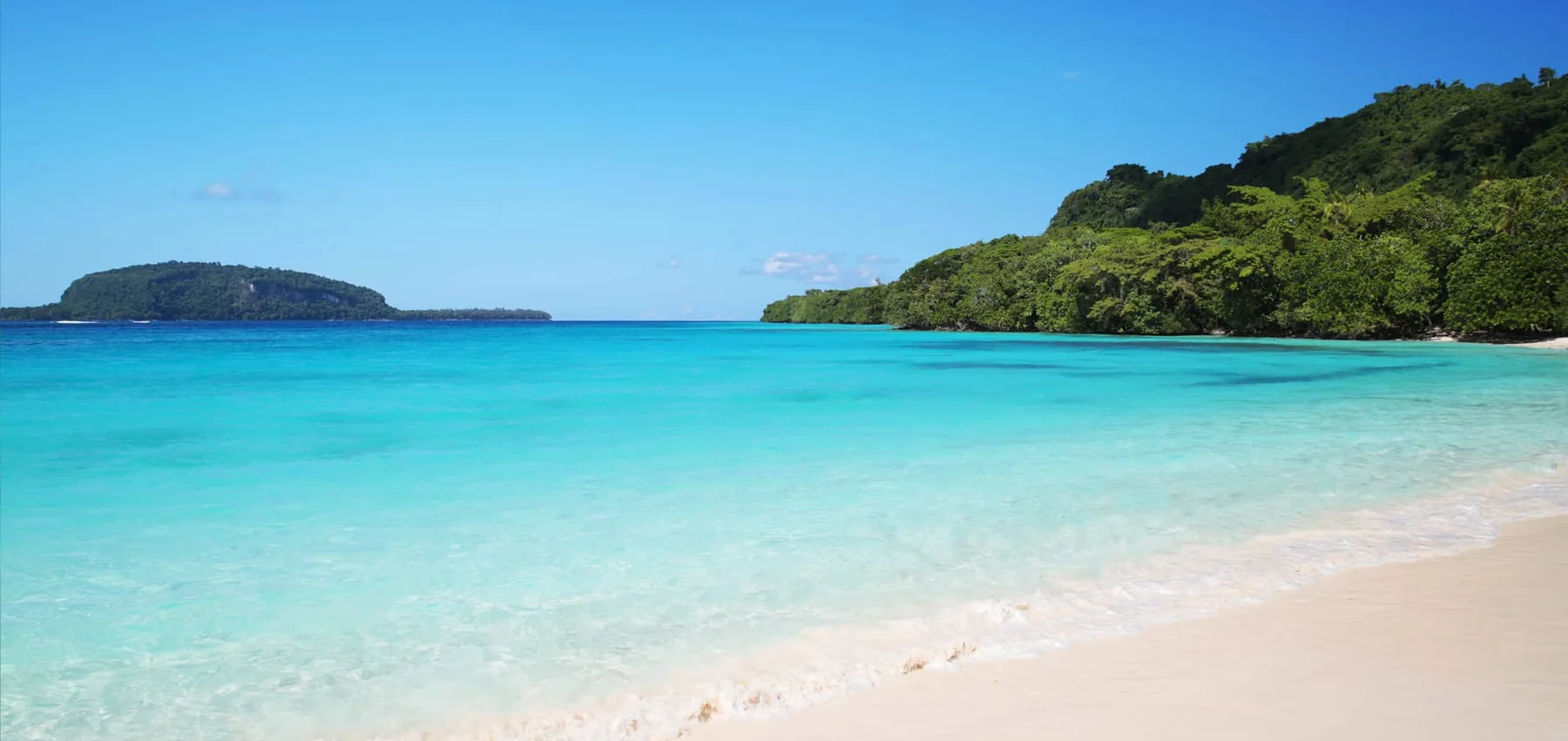 Clear turquoise water and tropical beach in Vanuatu